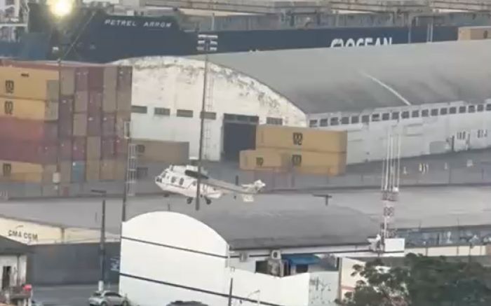 Helicópteros do GSI foram vistos sobrevoando o cais (Foto: Reprodução)