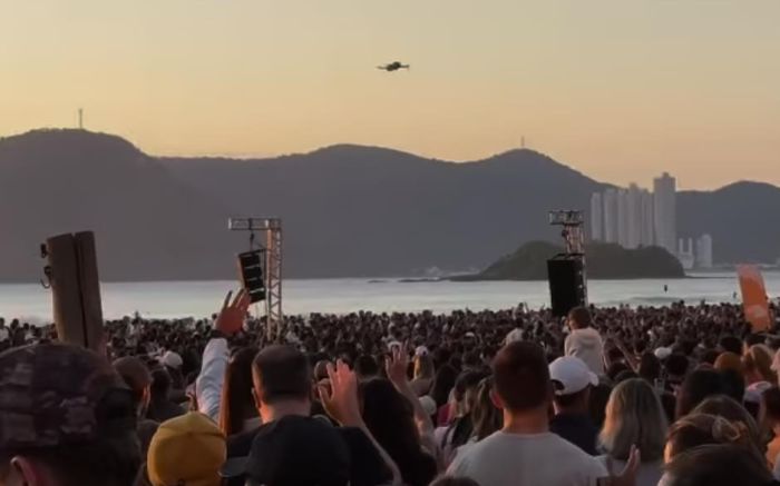 Fiéis participaram do evento na praia Central (Foto: leitor e Agentes de trânsito)